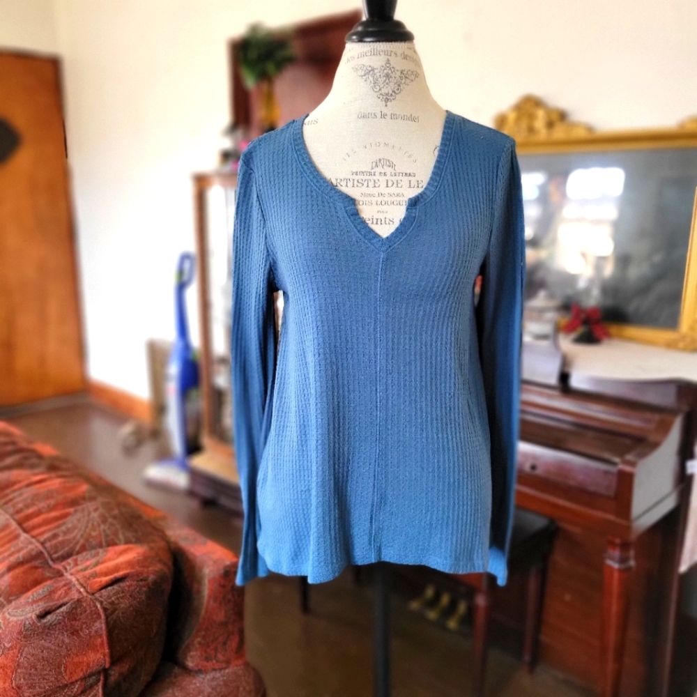 Blue long sleeve shirt.